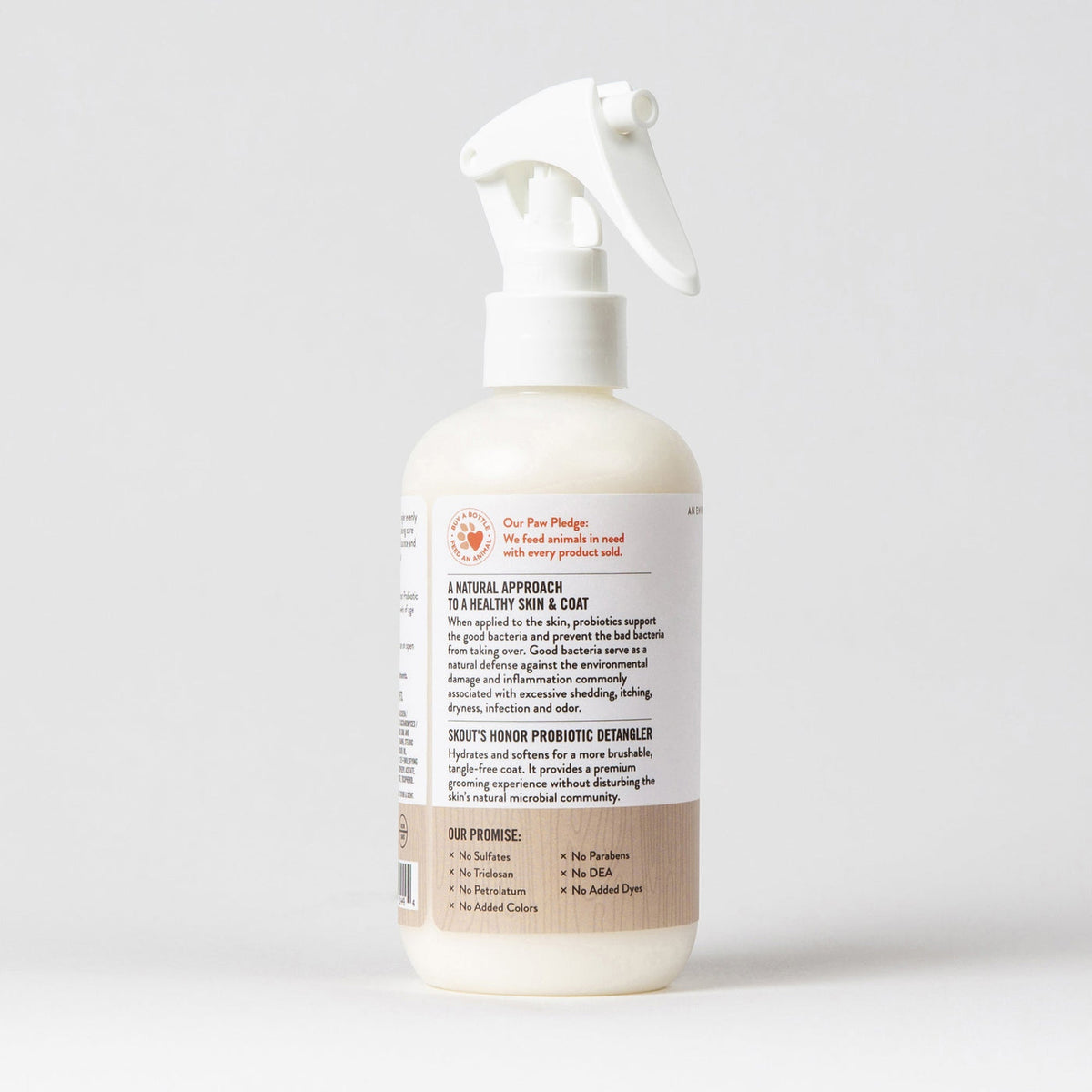 Dog Dish Skout's Honor Dog of the Woods probiotic detangler spray bottle with white label and trigger sprayer