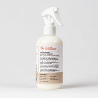 Dog Dish Skout's Honor Dog of the Woods probiotic detangler spray bottle with white label and trigger sprayer