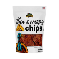 Dog Dish Wild Meadow Farms turkey crispy chips in a white pouch with a colorful turkey illustration