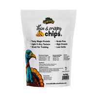 Dog Dish Wild Meadow Farms turkey crispy chips bag with grain-free, high-protein dog treat information.