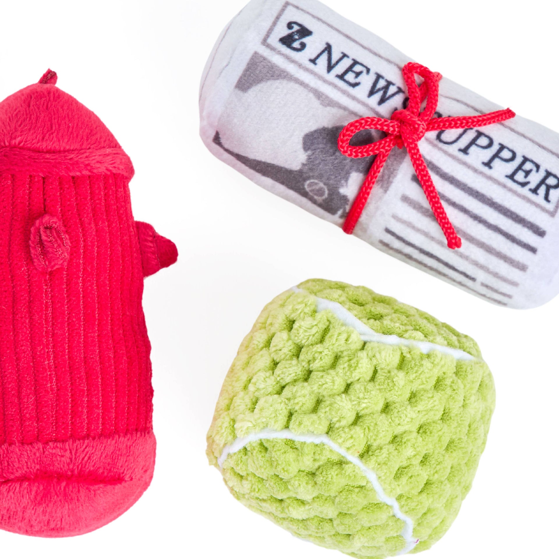ZippyPaws Dog's Best Friends 3-Pack plush squeaky toys displayed together showing detailed stitching and soft fabric textures.