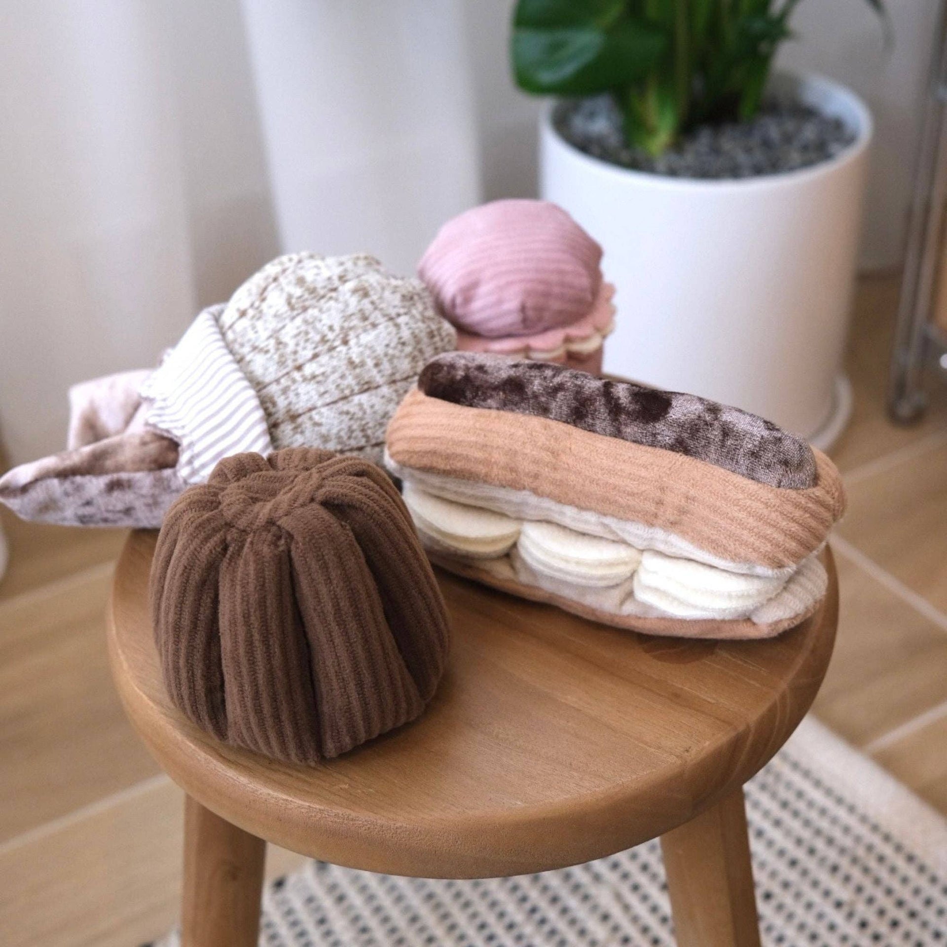 Lambwolf Collective Eclair snuffle toy showing textured cream-colored flaps and multiple fabric textures for dog enrichment.