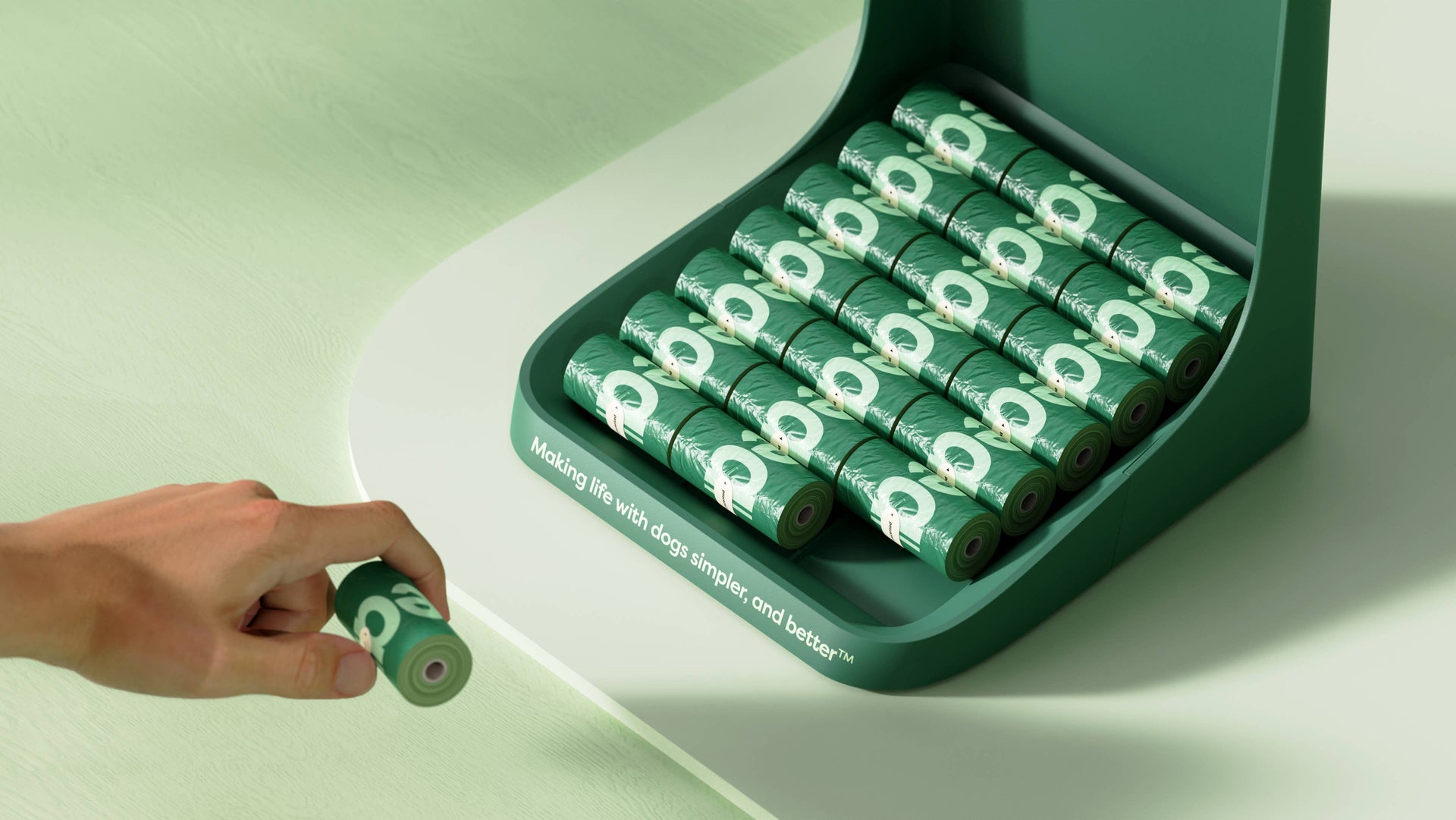 Earth Rated single poop bag roll shown with individual bag pulled out demonstrating extra length and thickness.