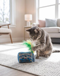 Haute Diggity Dog Meowwife Sardines Catnip Toy with Feathers shown in a playful lifestyle setting.