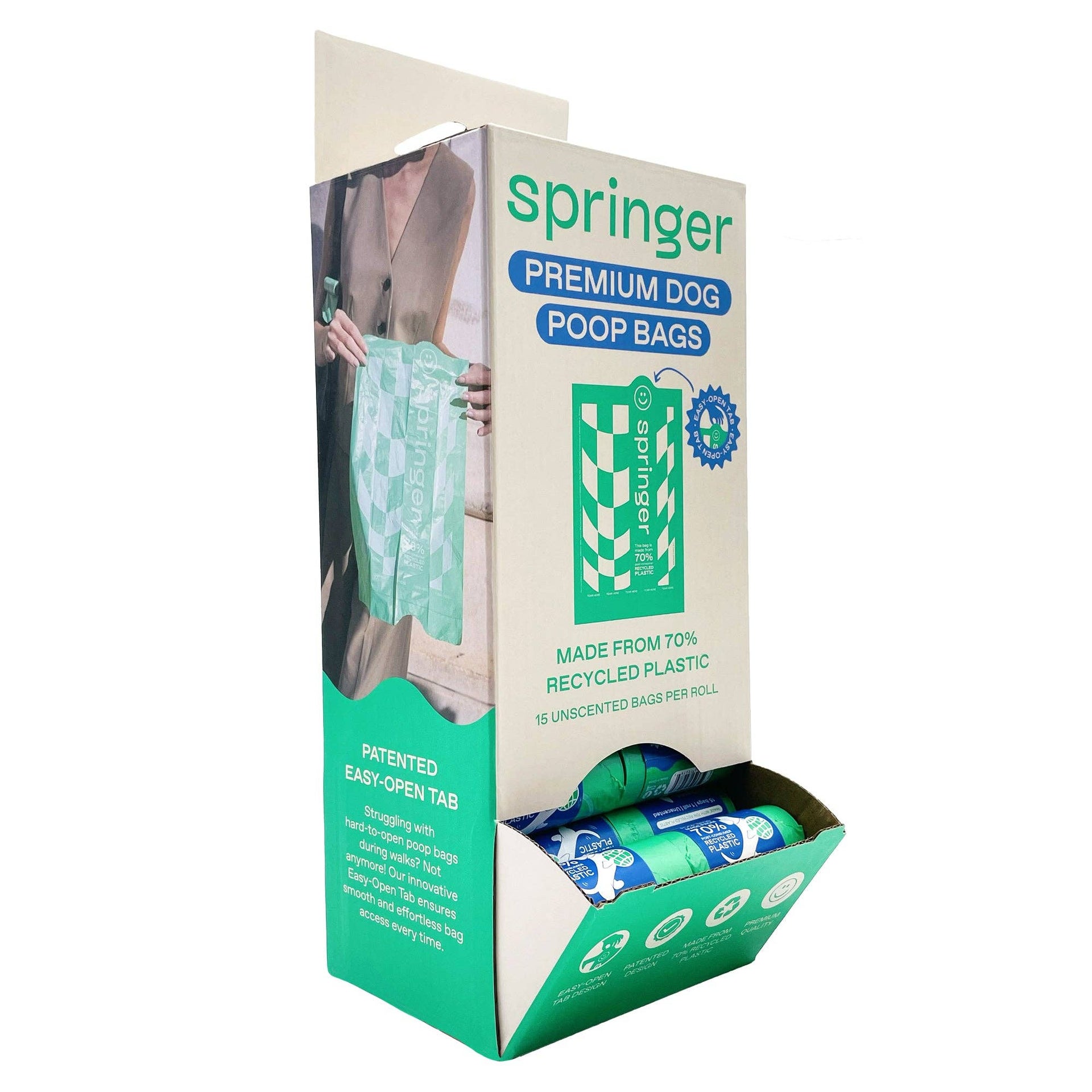 Springland single poop bag roll showing detailed view of perforated tear lines and bag thickness.