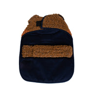 Shinola Pet brown barn style dog coat showing adjustable straps and reversible design details