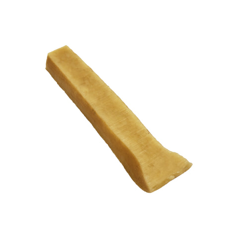 Close-up detail of Himalayan Dog Chew Medium Himalayan Chew showing its natural golden-brown texture and dense composition.