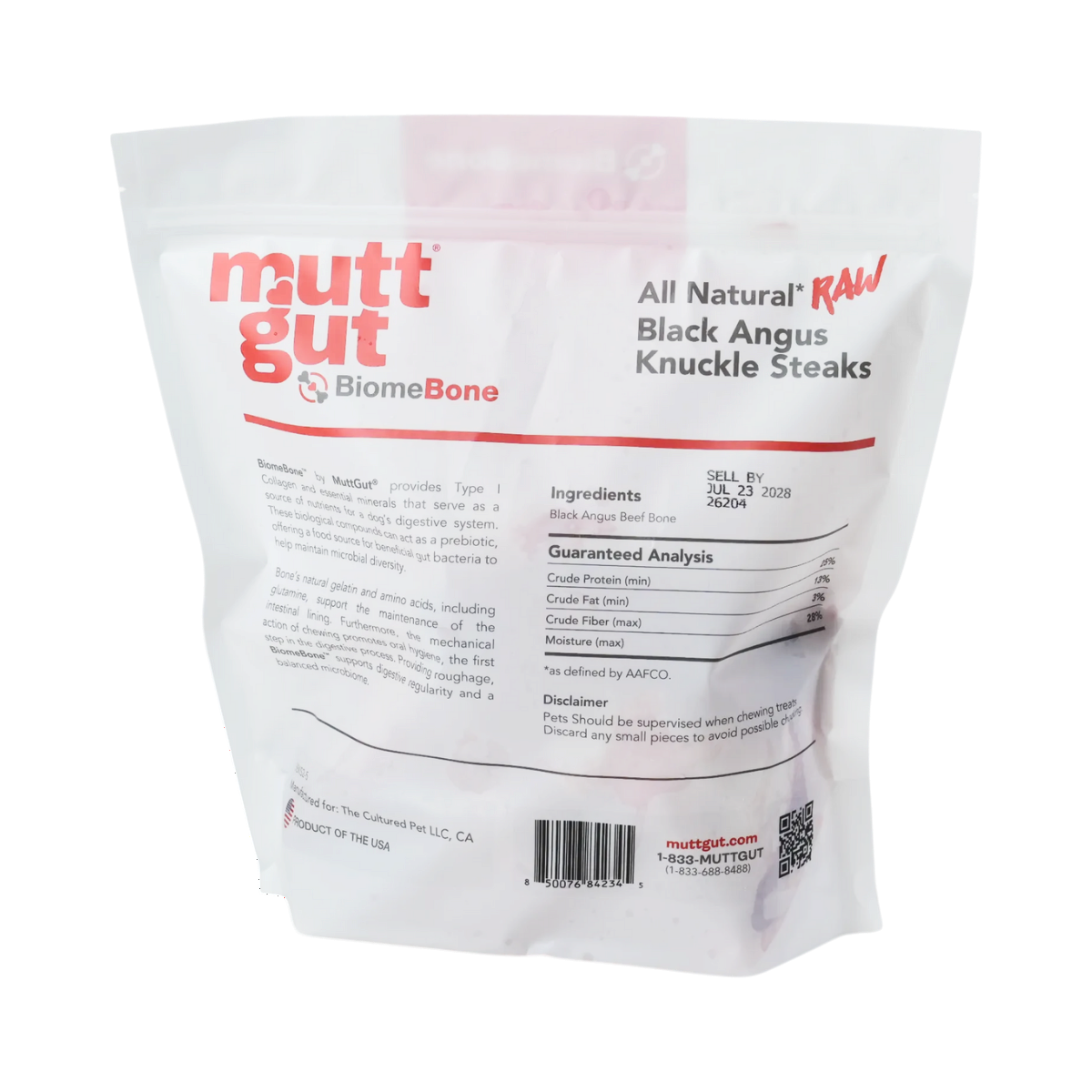 Close-up detail of Mutt Gut raw knuckle steak bone showing texture and natural marrow.