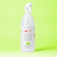 Skout's Honor Stain & Odor Remover 35oz bottle being used to clean pet mess on carpet