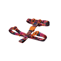 Zee.Dog Selva H Harness displayed in a vibrant jungle-inspired pattern for dogs.